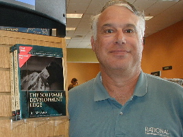 Proud author with his book